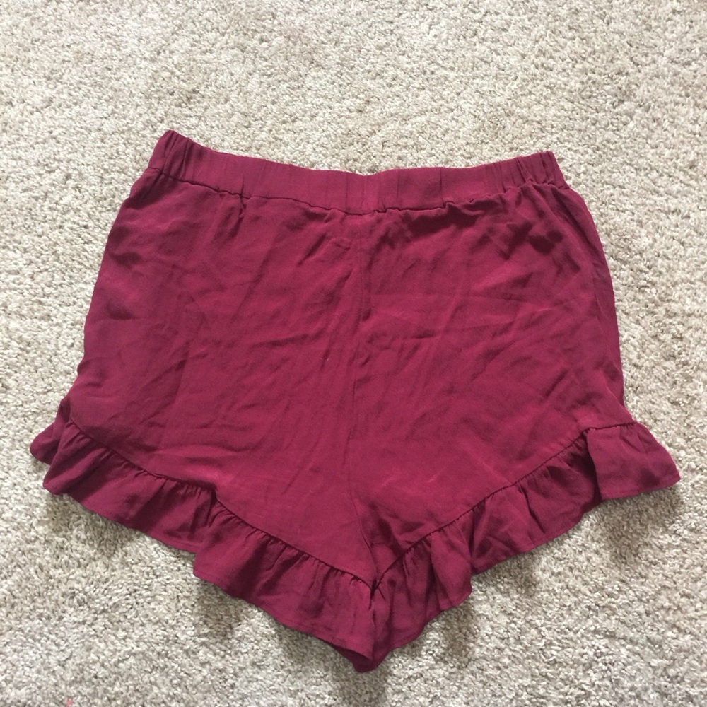 maroon colored flowy ruffle shorts